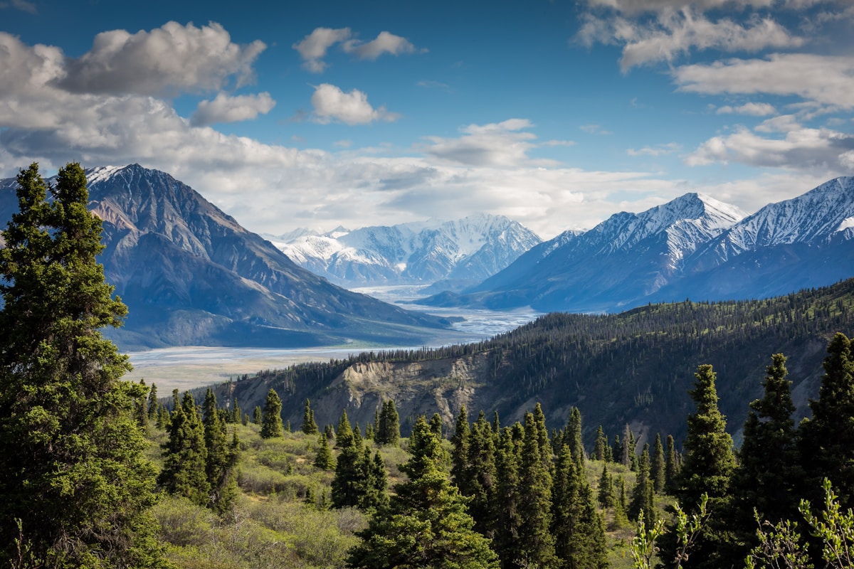 Rocky mountain peaks beneath drifting clouds
